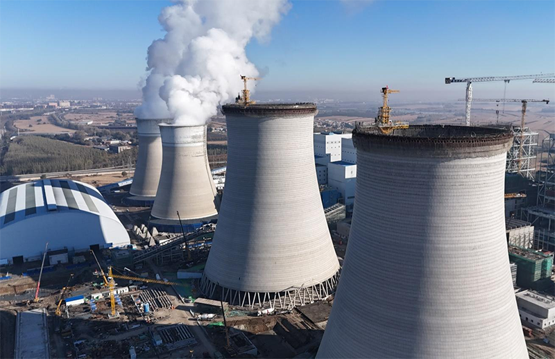 筑顶冰城暖源！国能哈热二期项目3号排烟冷却塔顺利封顶